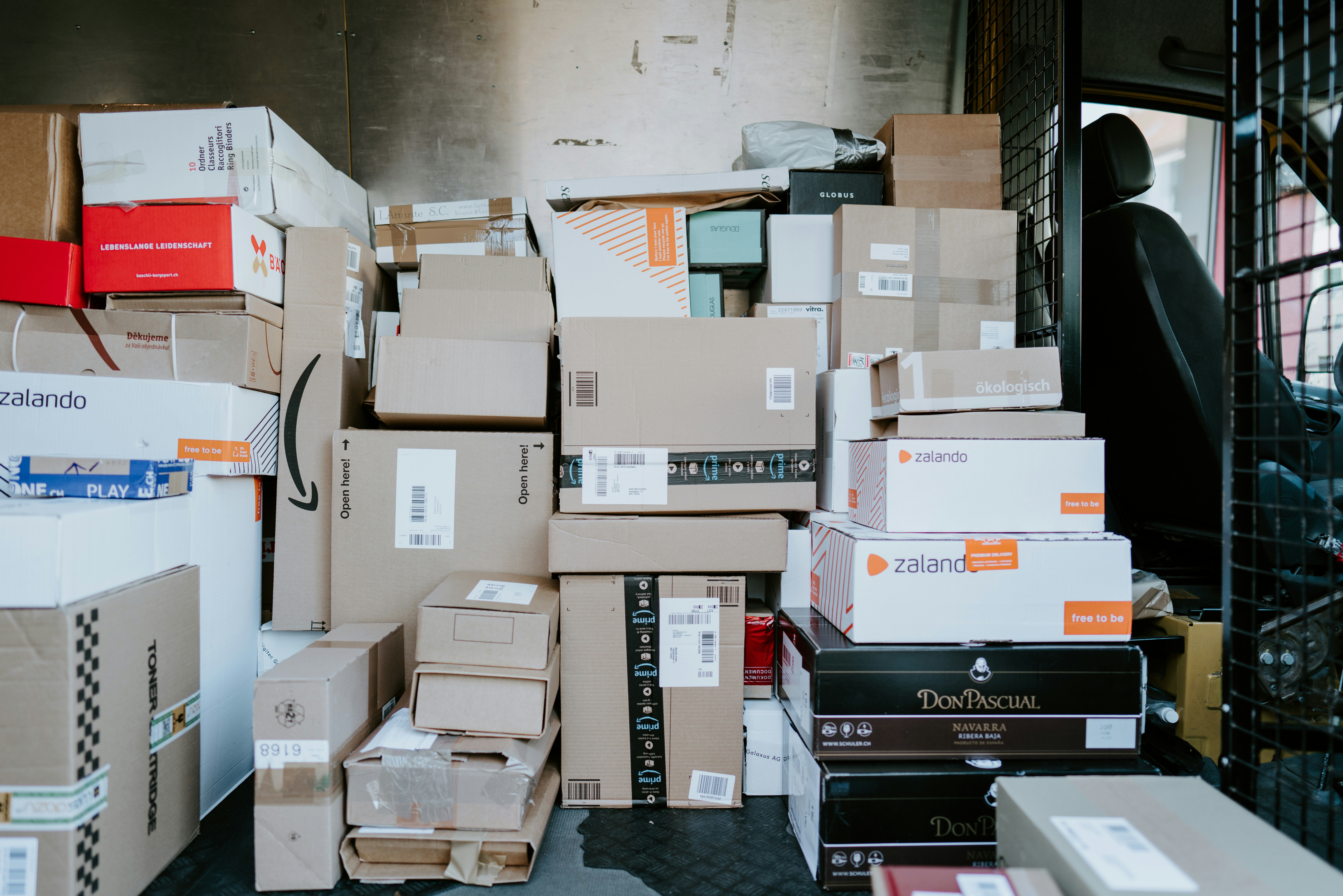 Parcels and packages stacked in a van